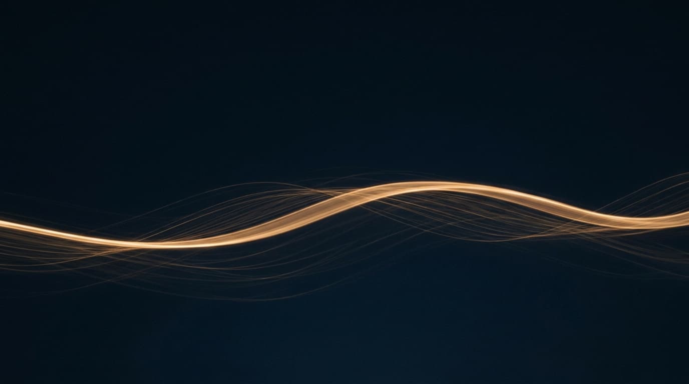 A single ribbon of warm light sweeping across deep blue darkness